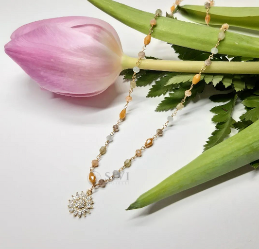 Collana rosario con cristalli beige, arancioni, lilla e girasole con zirconi